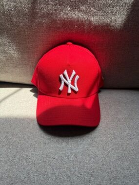 New Era Red Baseball Cap with White NY Logo 9 Forty A frame